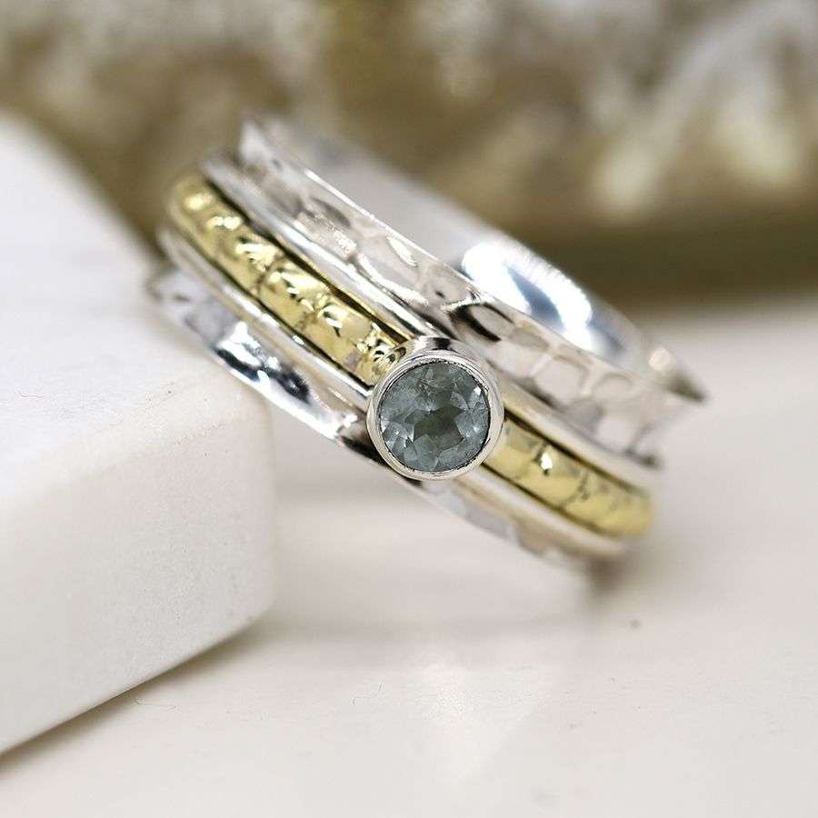 Sterling Silver Spinning Ring With Cut Blue Topaz From The Dotty House