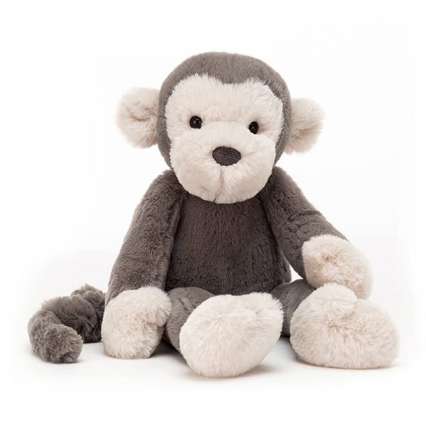 A jellycat soft toy monkey with cute cream ears and face and a soft brown body