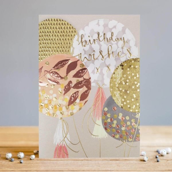 Luxury birthday card with big balloons decorated with gold foil in pastel pinks, greys and cream