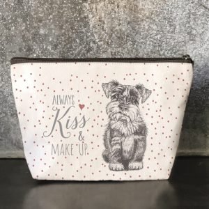 A natural cream linen with red spots cosmetic bag with a black lining and zip fastening. Printed with a picture of a cute dog and the words always kiss and makeup