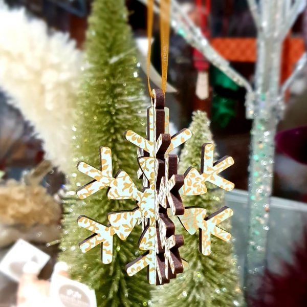 A 3D wooden snowflake tree decoration in duck egg blue and gold