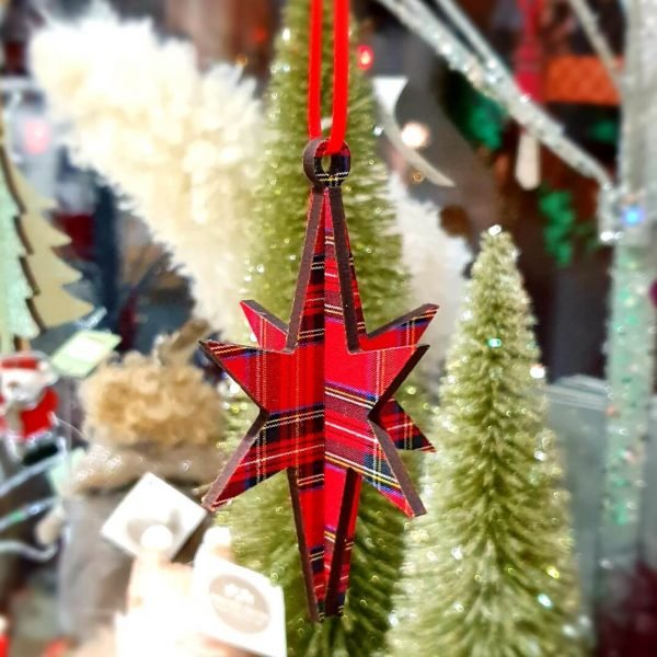 A 3D wooden Christmas star decoration in tartan.