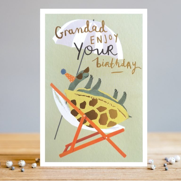 A fun birthday card for your Grandad with an image of a turtle in a deckchair with a colourful parasol The words Grandad Enjoy Your Birthday printed on it.