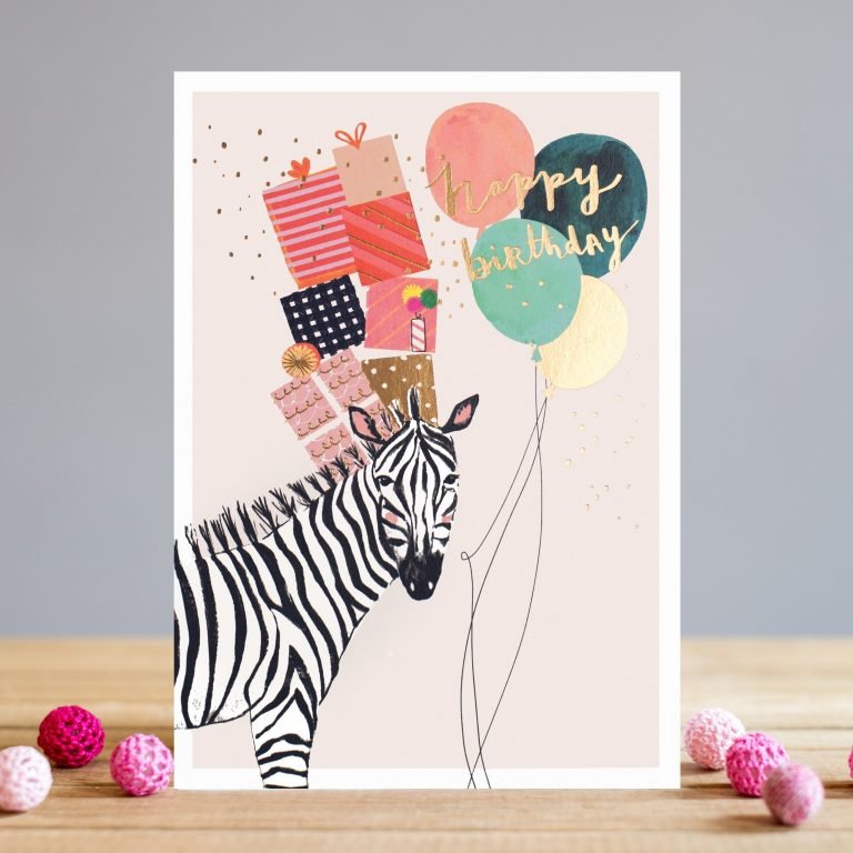 A cute birthday card with an image of a zebra on its way to a party. The zebra has a bunch of balloons and a ton of presents puuled on its head.