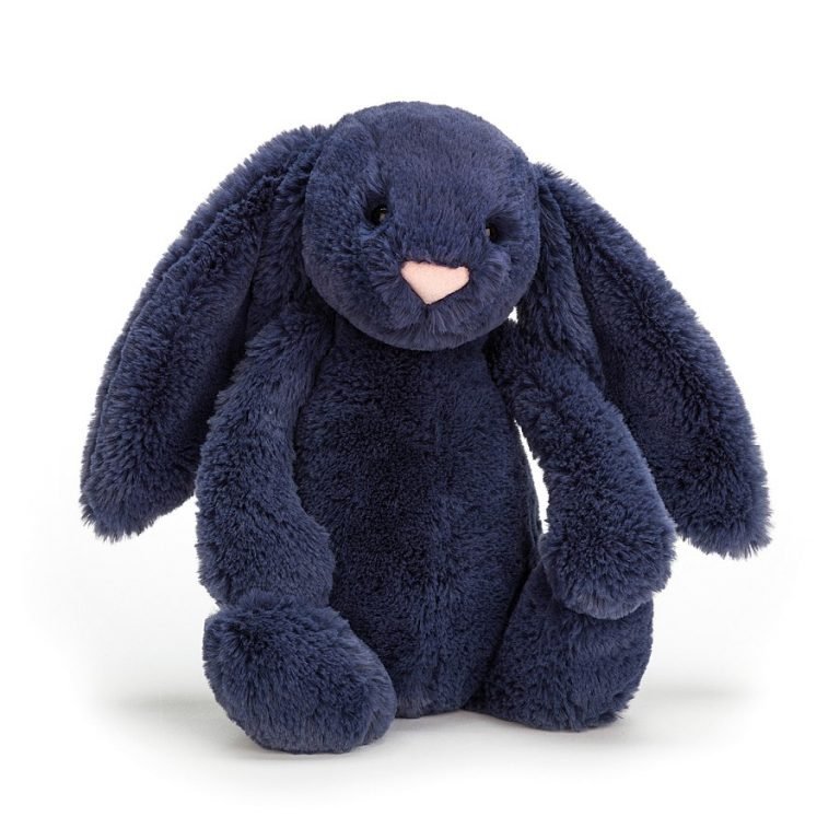 A navy blue fluffy bunny with floppy ears and little pink nose.