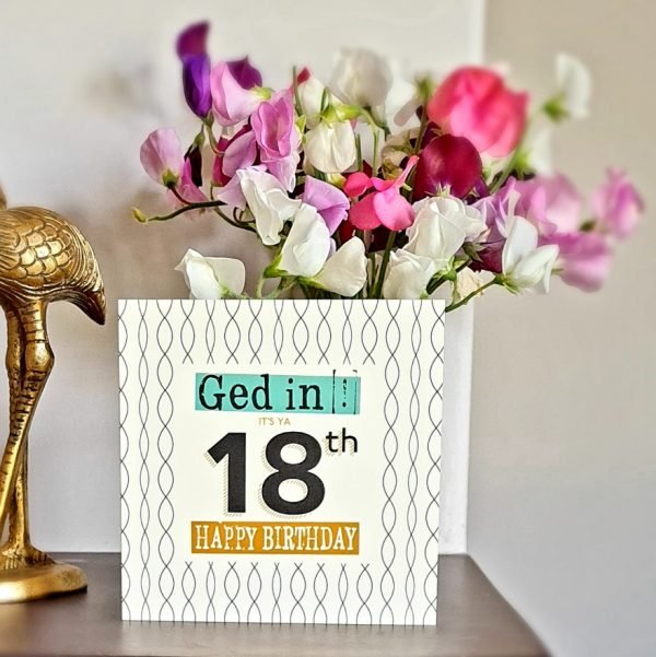 A geordie 18th birthday card with a geometric design in cream and mustard with teal and black. Ged in#!! 18th Birthday