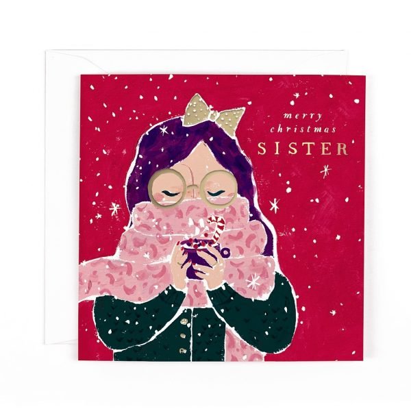 A sister Christmas card in festive red with a girl wrapped up for winter hugging a hot chocolate. Merry Christmas Sister