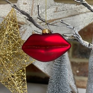 A wonderful glass hanging decoration which is in the shape of a pair of red lips with a gold hanger and added glitter.