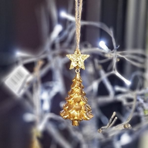 A gold Christmas tree hanging decoration with a little gold glitter star on top