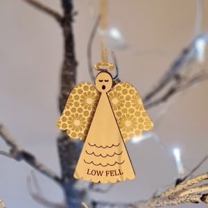 A wooden laser cut angel decoration with gold patterned wings a gold halo and Low Fell on the bottom of the Angel's dress