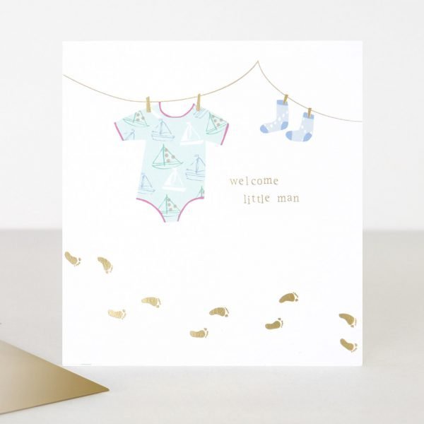 Welcome Little Man Card with gold foil footprints and a blue vest and socks on a washing line