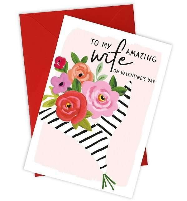 A lovely card with a bouquet of roses design whih has a black and white striped paper around it and the words To My Amazing WIfe on Valentine's day printed on it.