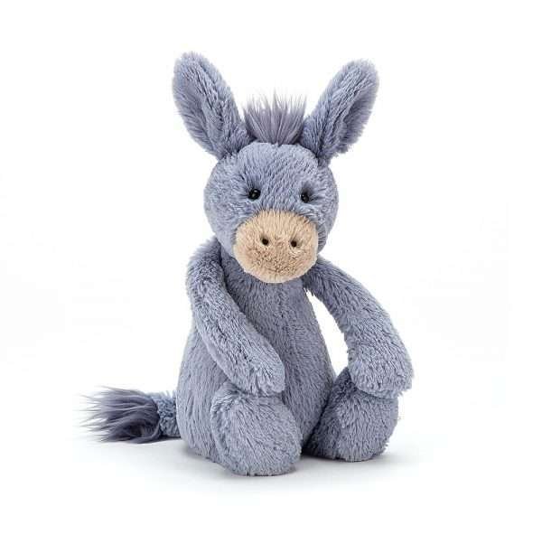 A cute blue grey bashful donkey from Jellycat. He has tall ears and a fluffy mane with a cream coloured snout.