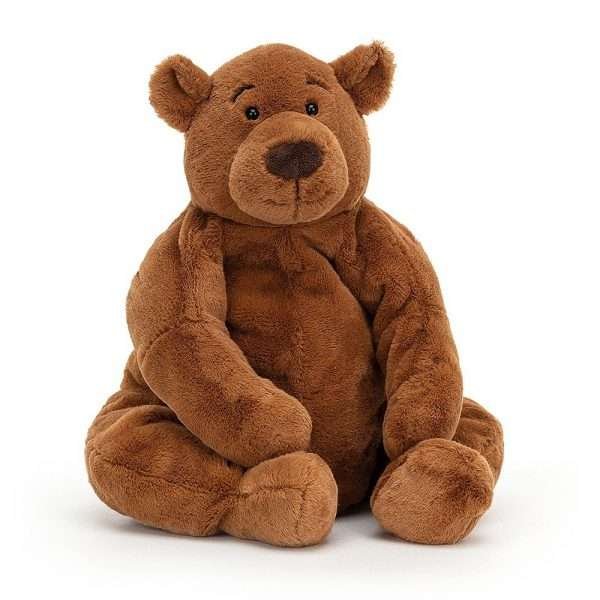 a lovely velvet brown teddy bear with sticky out ears velvet paws and a big plump tummy.