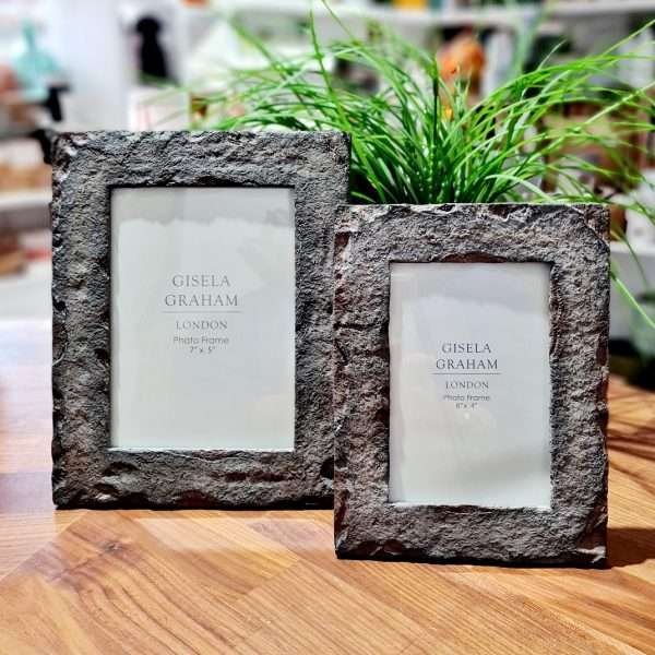 Picture frames in two sizes. The frames are made of resin made to look like rock