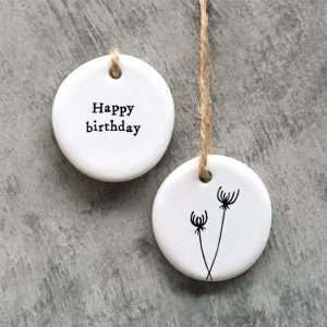 A sweet So Proud of You Floral Hanger from the ceramic range by East of India. A small keepsake with brown string hanger.