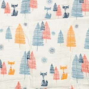 A babies cotton swaddle blanket with a colourful fox and trees design. Suitable for boys and girls