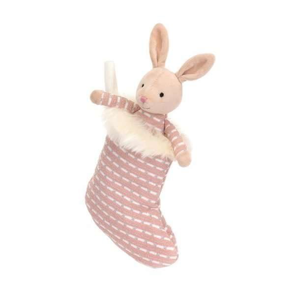 a cute little cuddly bunny in a pink jump0er tucked into a pink shimmery stocking