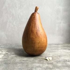 A lovely pear decoration made from wood by East of India