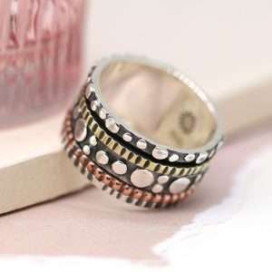 Sterling silver brass and copper spinning ring in a bubble design