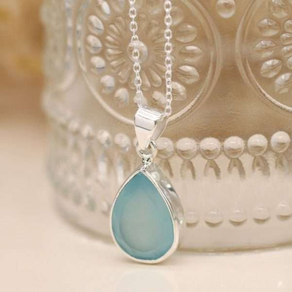 Sterling silver teardrop pendant with faceted semi-precious chalcedony gemstone on a silver chain, complete with extension to adjust the length.