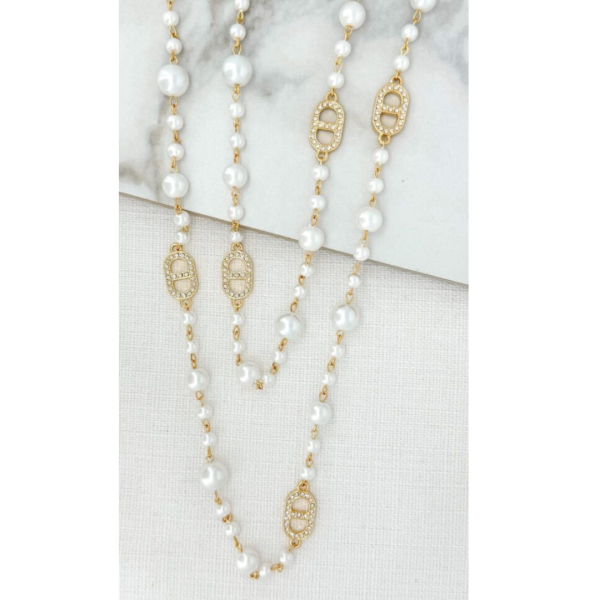 Long pearl and gold diamante necklace