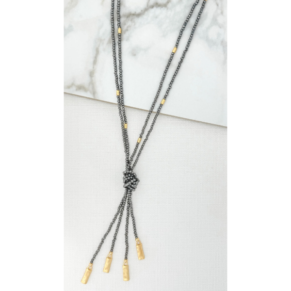 Grey and gold crystal knot necklace